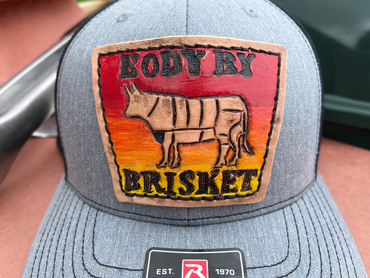 Body By Brisket BBQ Trucker Hat (painted and antiqued)